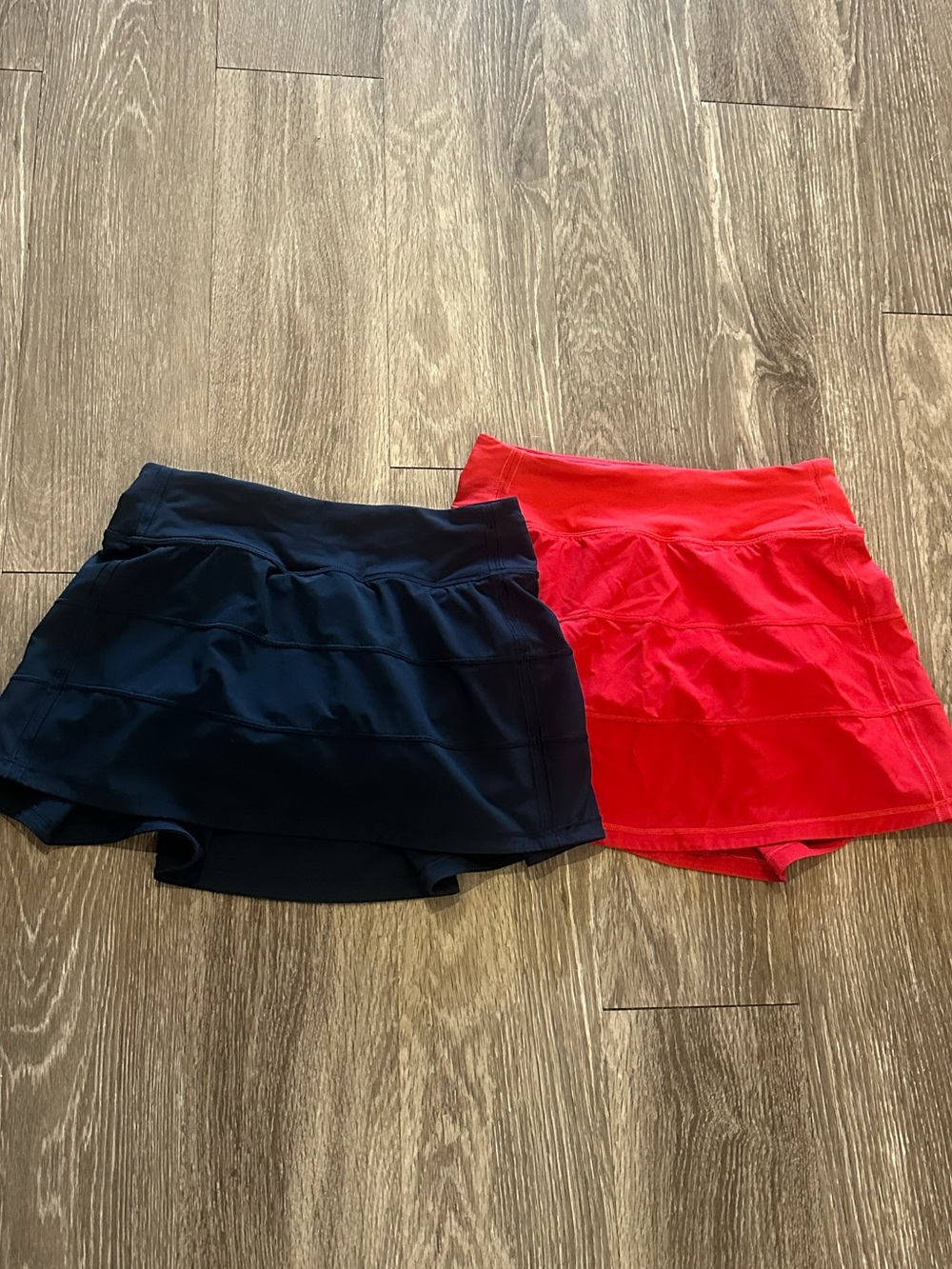 Bundle of 2 lululemon pace rival skirts navy and red size 2